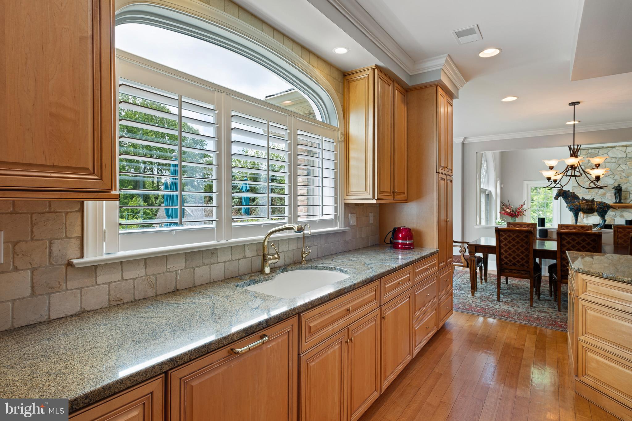 104 Indian Springs Road Kennett Square, PA 19348 - Photo 40 of 106 a kitchen with counter top space and wooden floor
