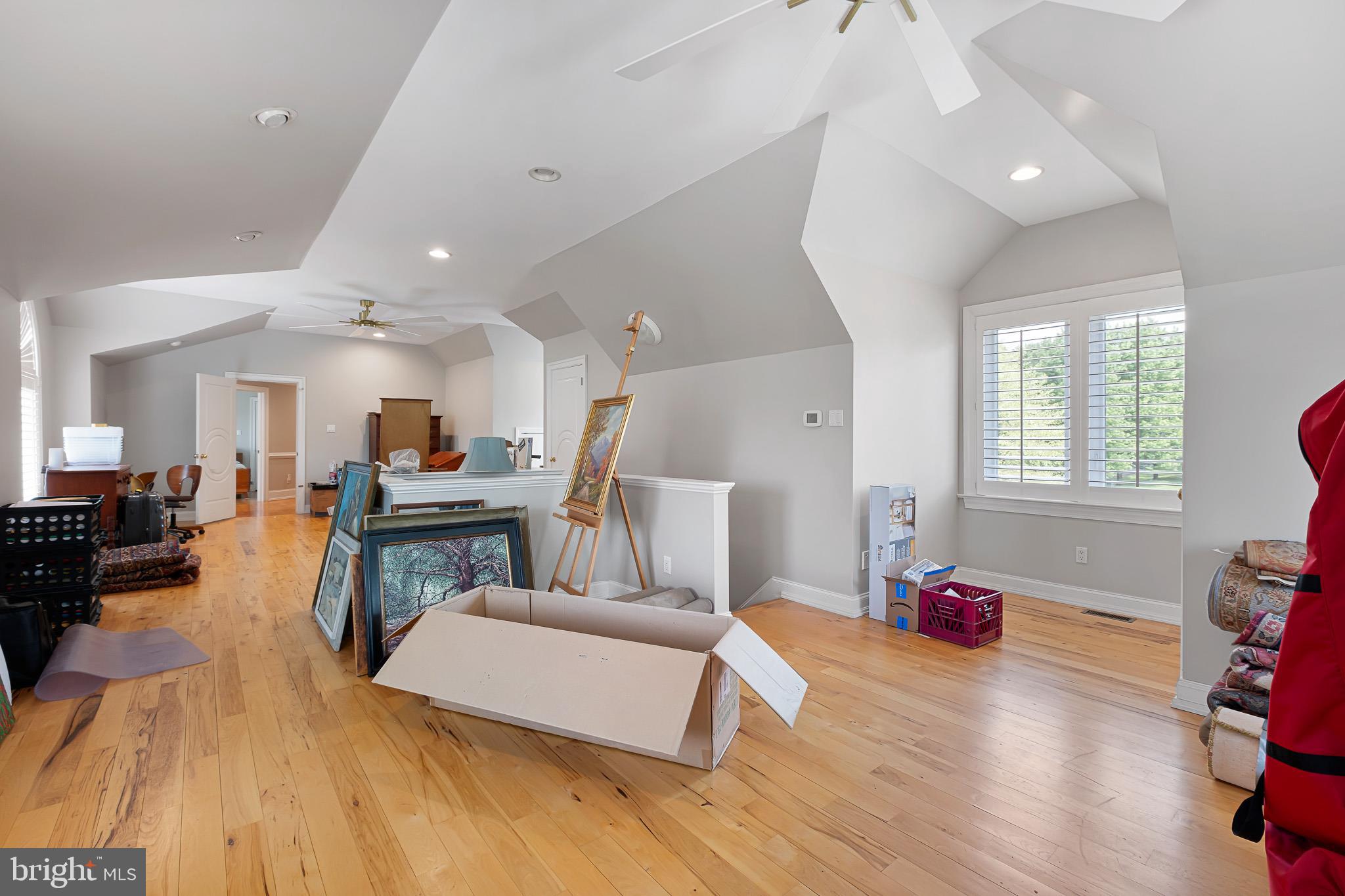 104 Indian Springs Road Kennett Square, PA 19348 - Photo 68 of 106 a living room with furniture and a wooden floor