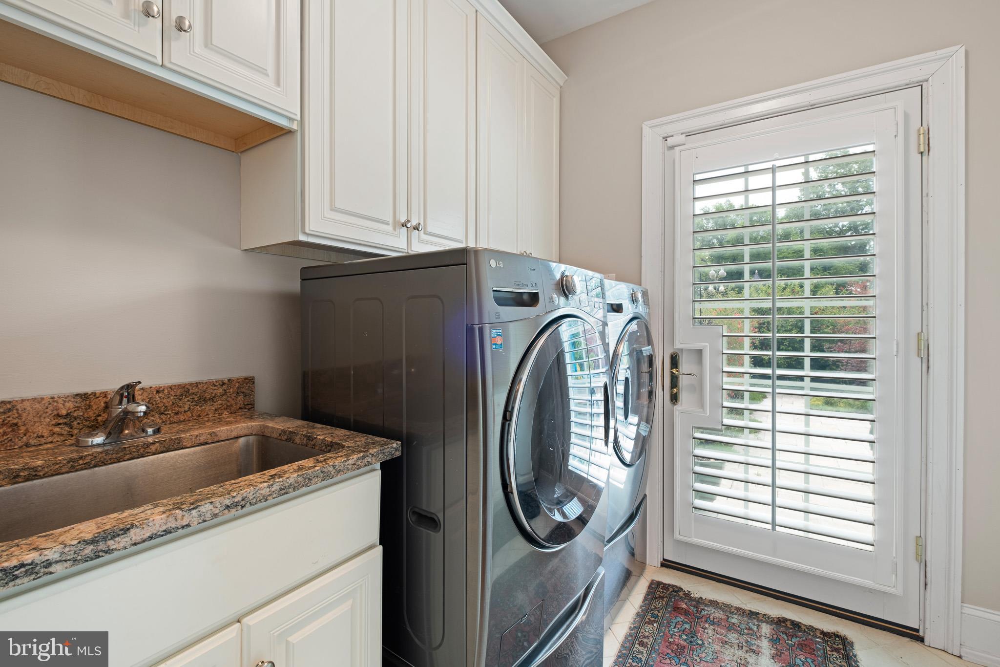 104 Indian Springs Road Kennett Square, PA 19348 - Photo 89 of 106 a utility room with dryer and washer
