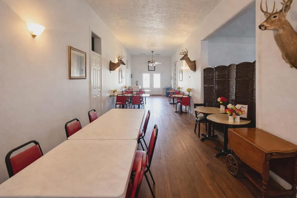 1504 Broad Street Lumpkin, GA 31815 - Photo 5 of 7 a living room with furniture and a flat screen tv