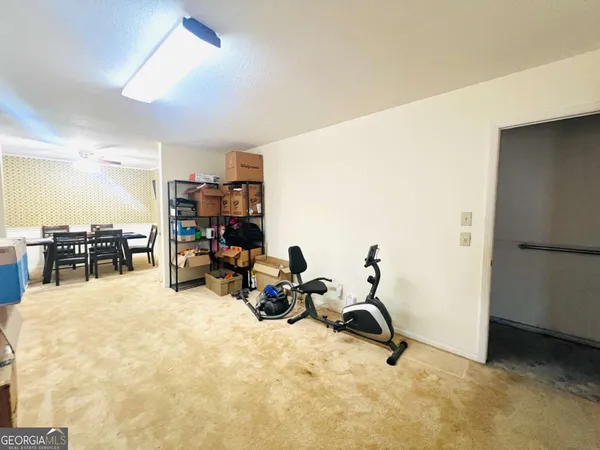 a view of a room with gym equipment