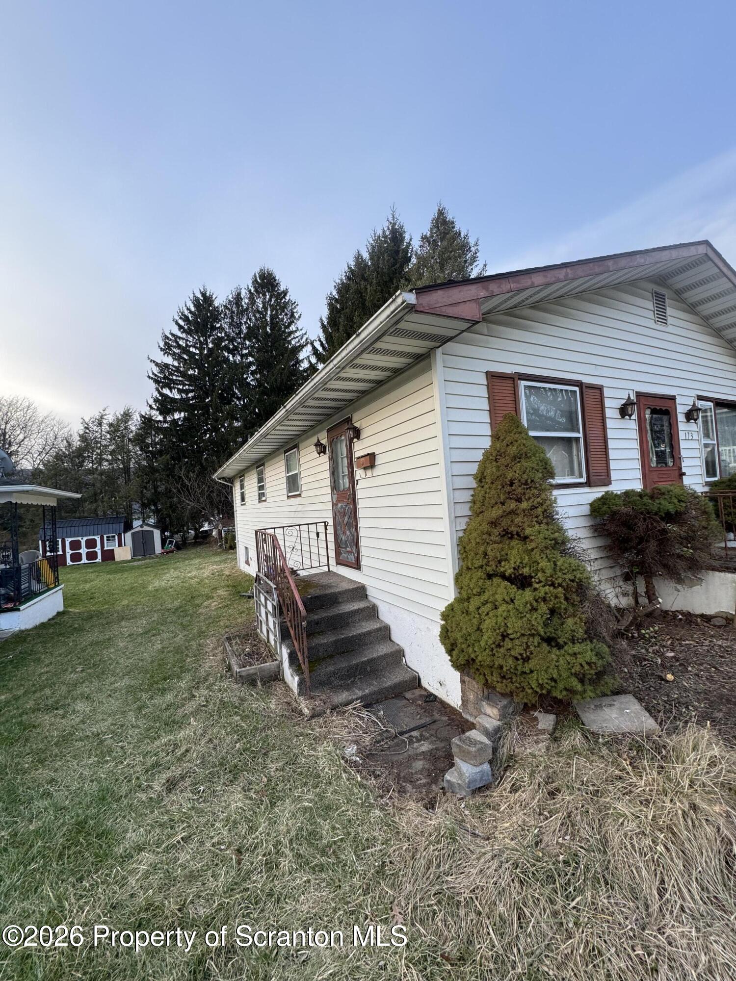 173 South Main Street Archbald, PA 18403 - Photo 2 of 6 a view of a house with a yard