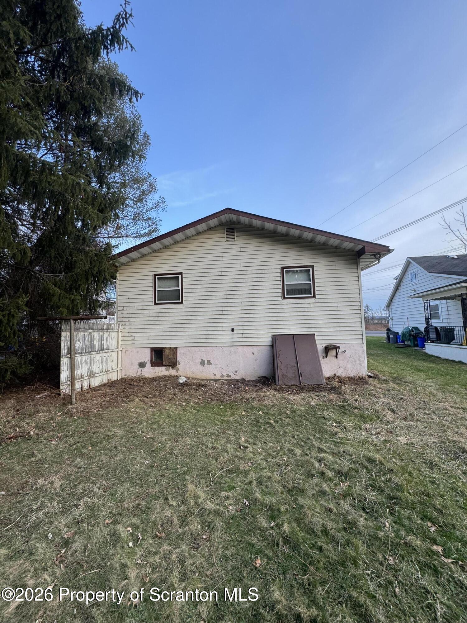 173 South Main Street Archbald, PA 18403 - Photo 5 of 6 a view of a house with a yard