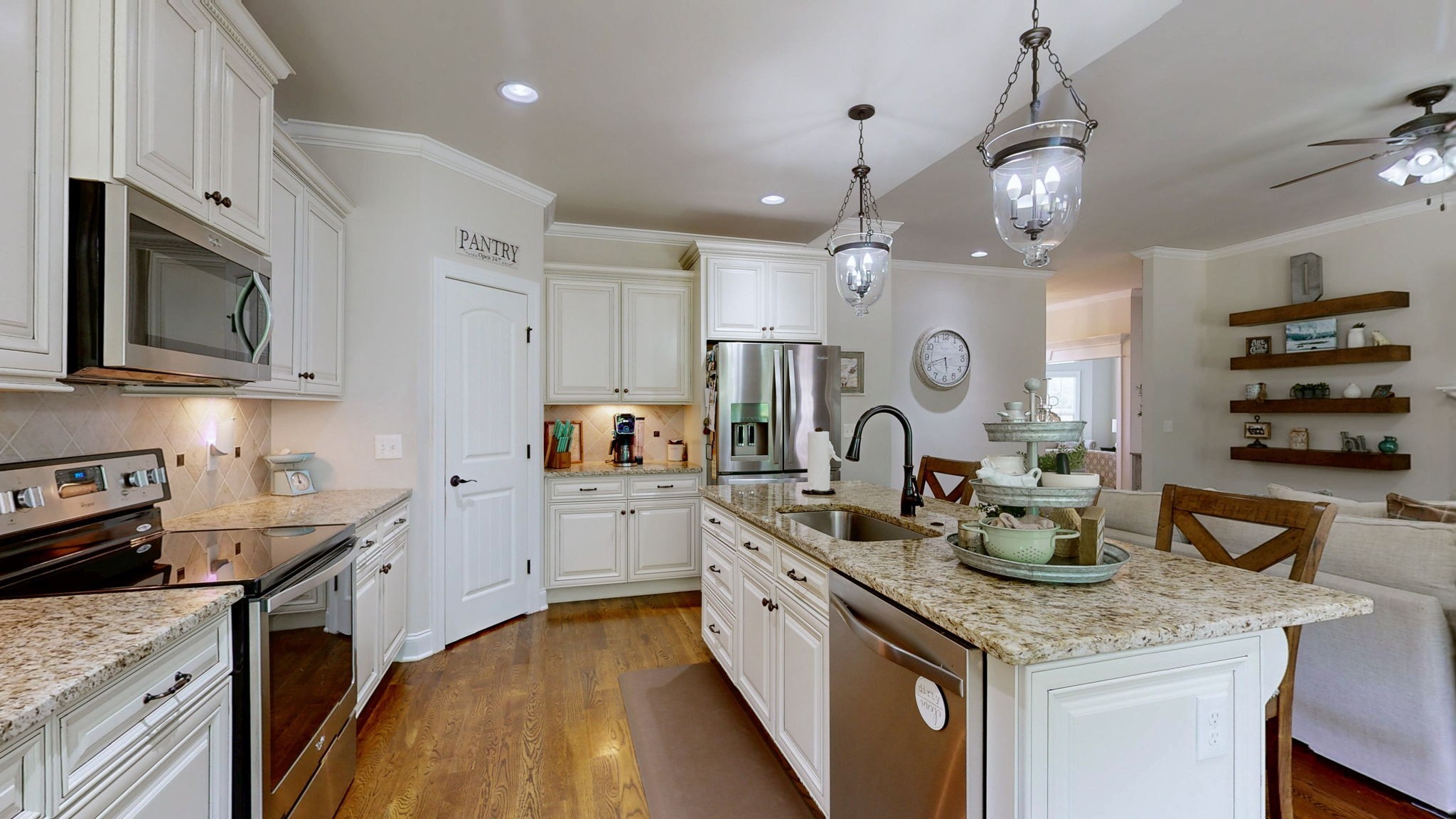 15505 Versailles Road Rockvale, TN 37153 - Photo 13 of 38 a kitchen with sink stove and cabinets