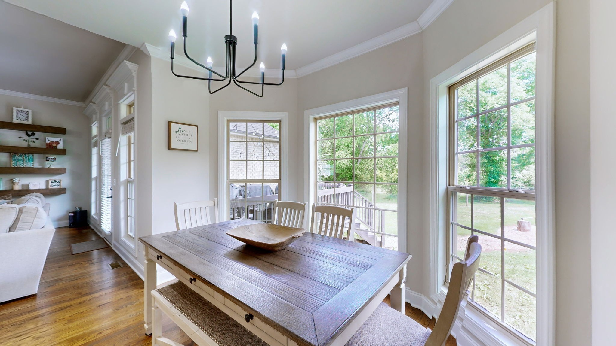 15505 Versailles Road Rockvale, TN 37153 - Photo 15 of 38 a view of a dining room with furniture window and wooden floor