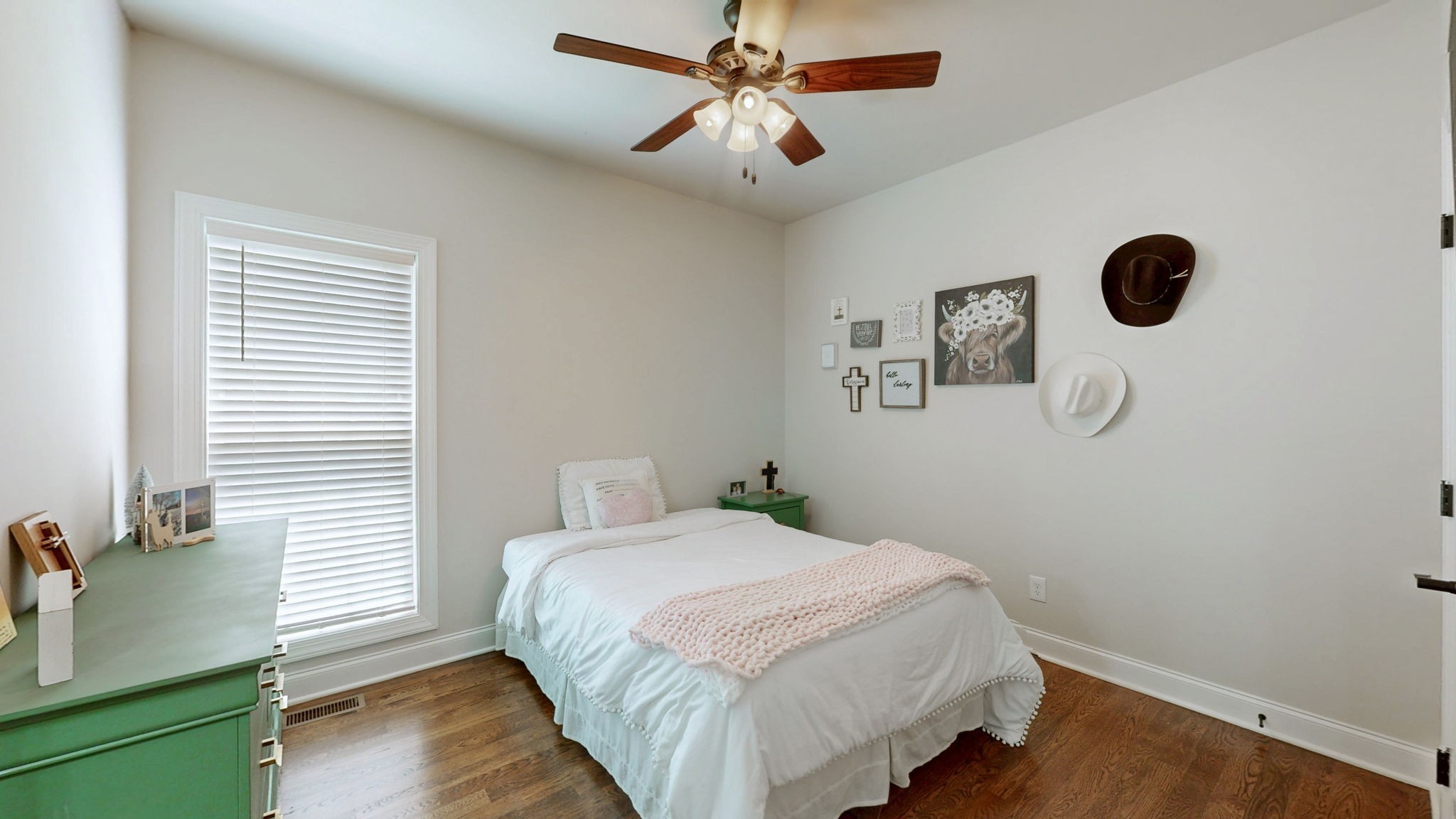 15505 Versailles Road Rockvale, TN 37153 - Photo 24 of 38 a bedroom with a bed and a chandelier