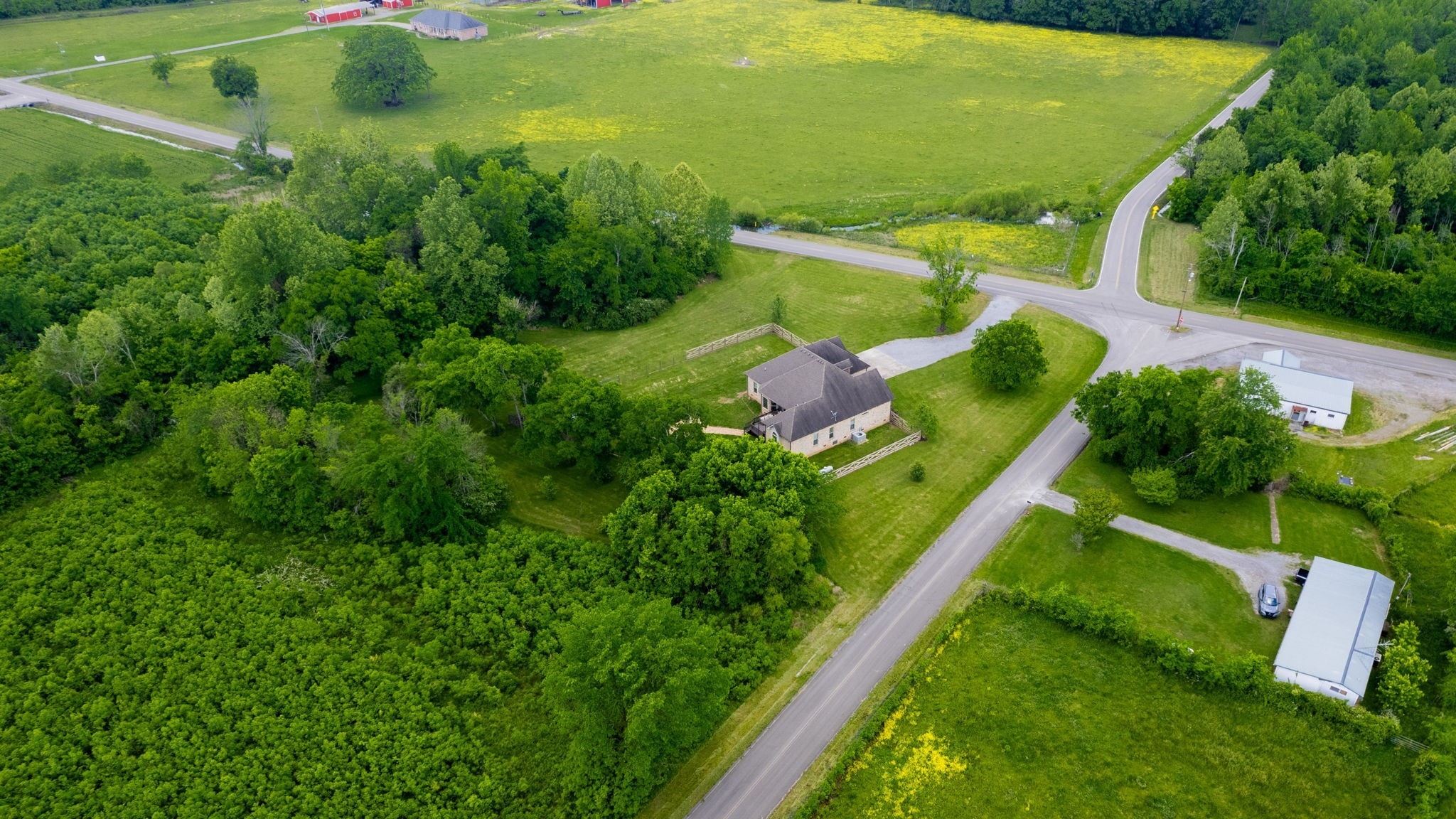 15505 Versailles Road Rockvale, TN 37153 - Photo 34 of 38 an aerial view of residential houses with outdoor space and street view