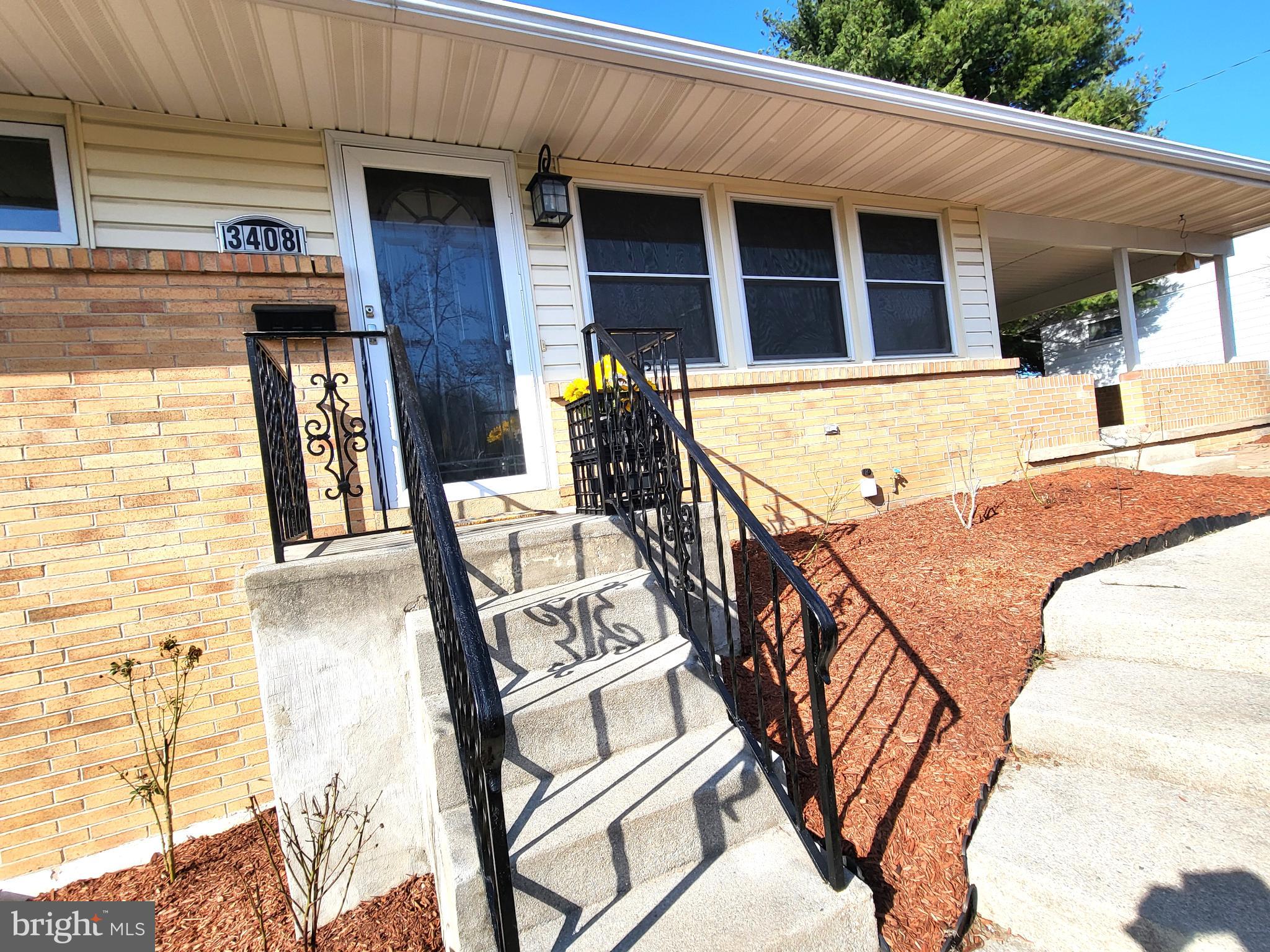 3408 Ridgeway Road Harrisburg, PA 17109 - Photo 3 of 40 a view of a patio with table and chairs with wooden floor and fence