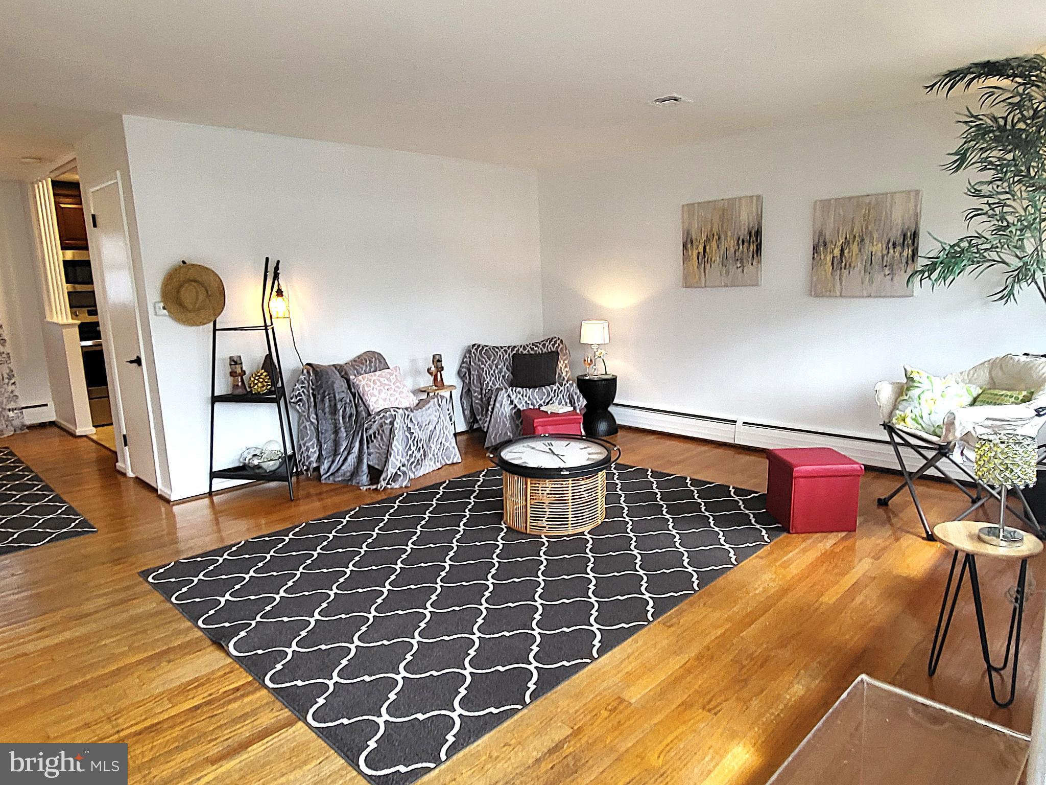 3408 Ridgeway Road Harrisburg, PA 17109 - Photo 6 of 40 a bedroom with a bed and wooden floor