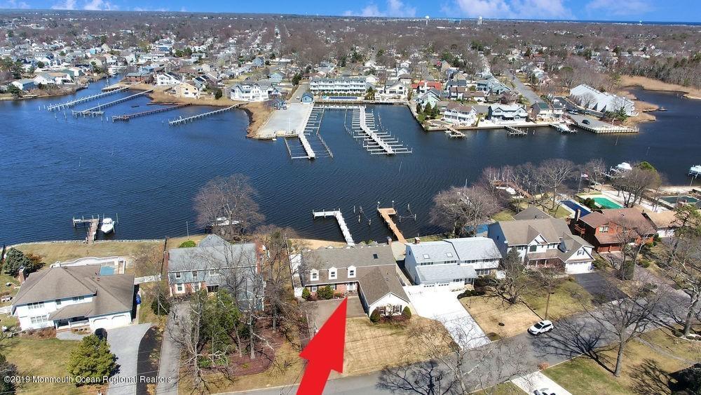 566 Harbor Road Brick, NJ 08724 - Photo 1 of 100 an aerial view of a residential houses with outdoor space