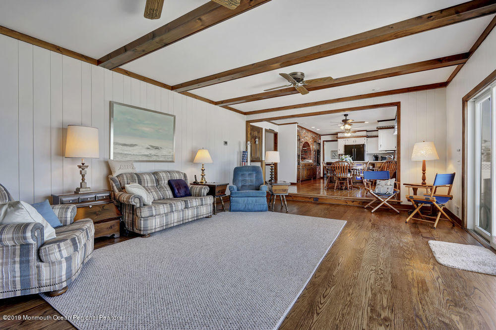 566 Harbor Road Brick, NJ 08724 - Photo 22 of 100 a living room with furniture and a wooden floor