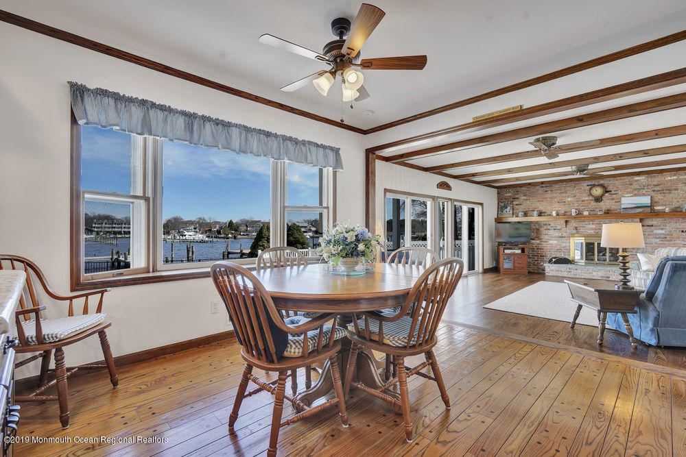 566 Harbor Road Brick, NJ 08724 - Photo 27 of 100 a dining room with furniture window and wooden floor