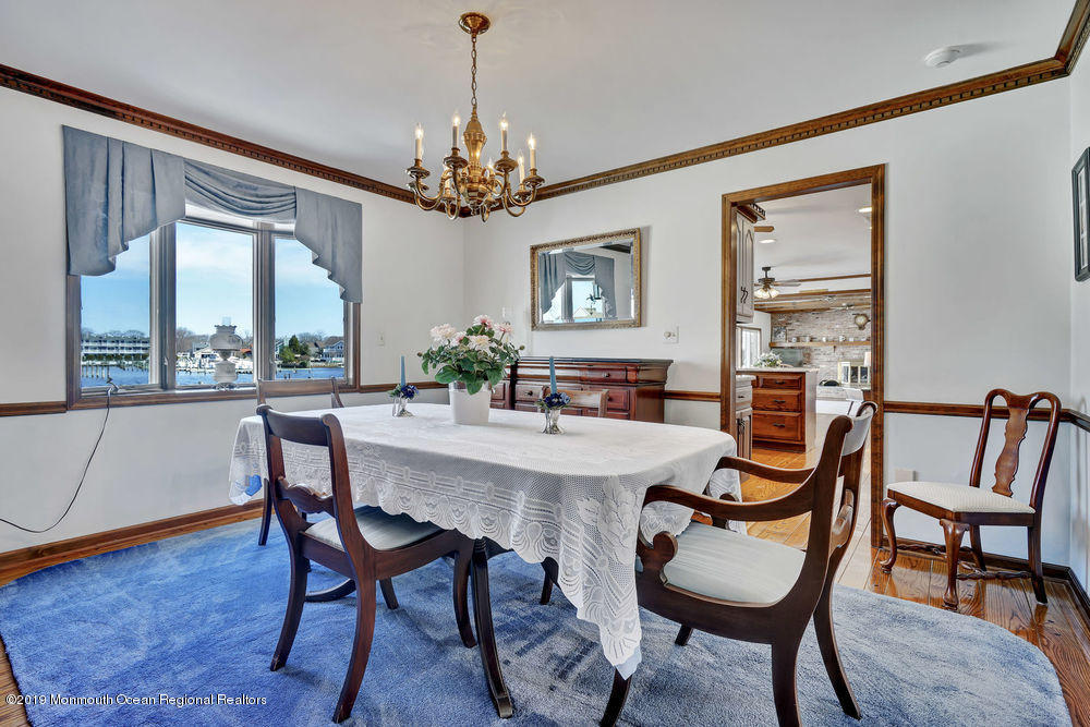 566 Harbor Road Brick, NJ 08724 - Photo 38 of 100 a view of a dining room with furniture window and wooden floor