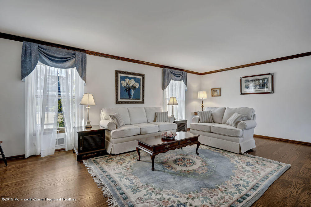 566 Harbor Road Brick, NJ 08724 - Photo 42 of 100 a living room with furniture and a wooden floor