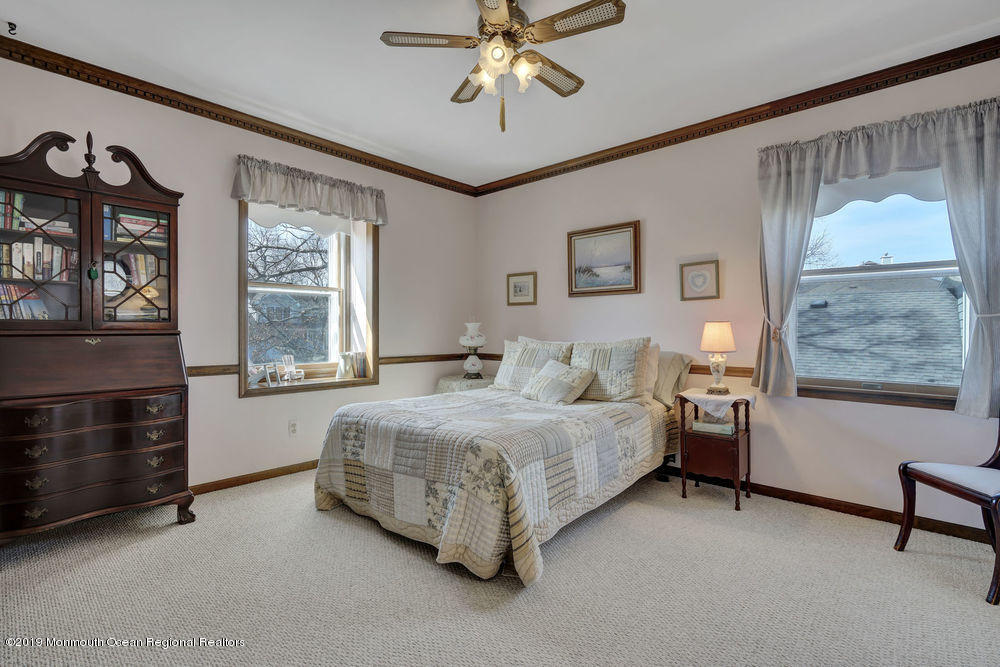 566 Harbor Road Brick, NJ 08724 - Photo 68 of 100 a spacious bedroom with a bed and a window