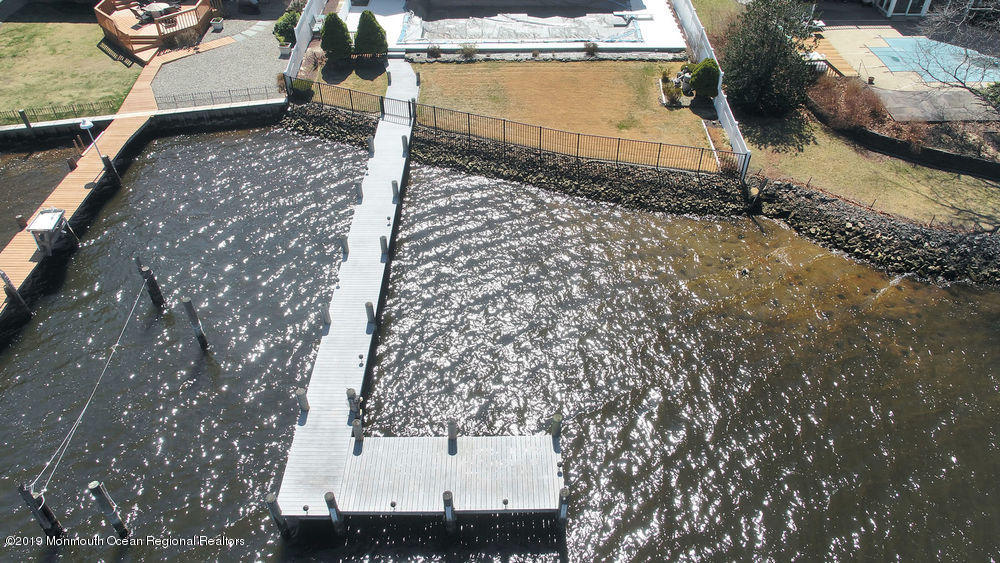 566 Harbor Road Brick, NJ 08724 - Photo 89 of 100 an aerial view of a house with a yard