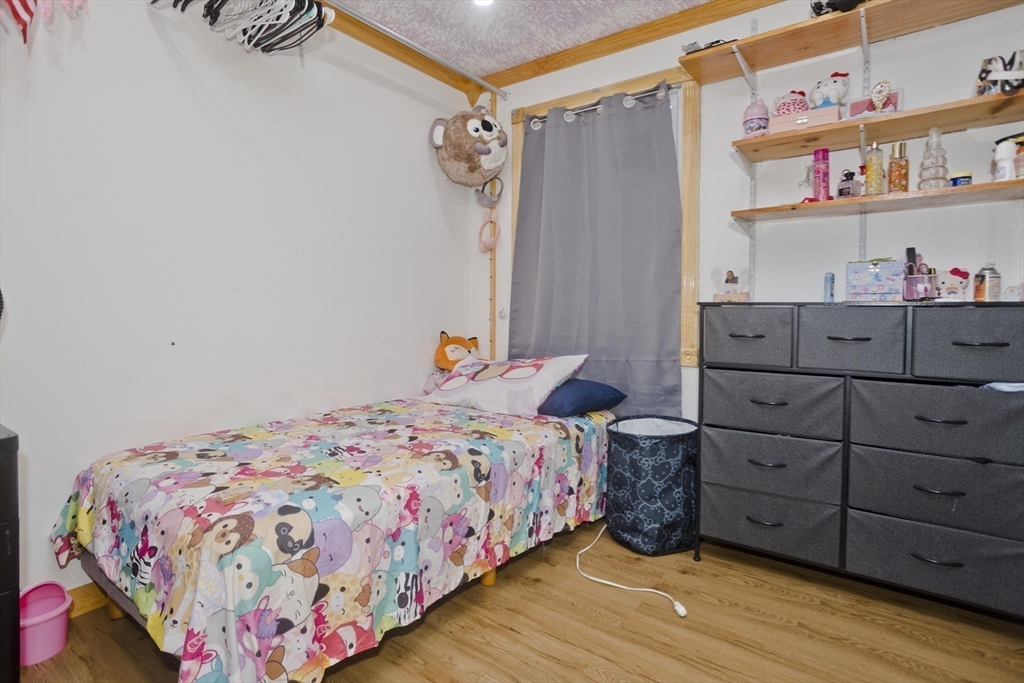 10 View Street Holyoke, MA 01040 - Photo 22 of 38 a bedroom with a bed and a closet