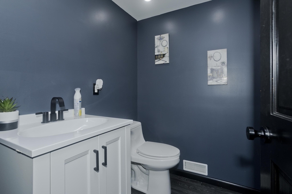 10 View Street Holyoke, MA 01040 - Photo 32 of 38 a bathroom with a sink vanity and toilet