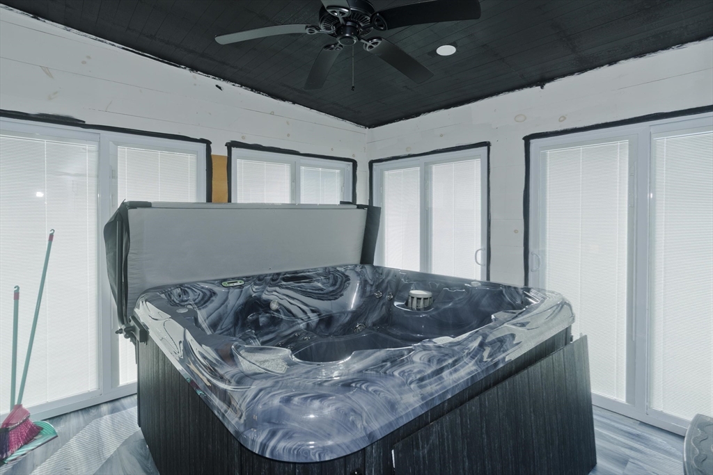 10 View Street Holyoke, MA 01040 - Photo 33 of 38 a living room with granite countertop furniture and a chandelier