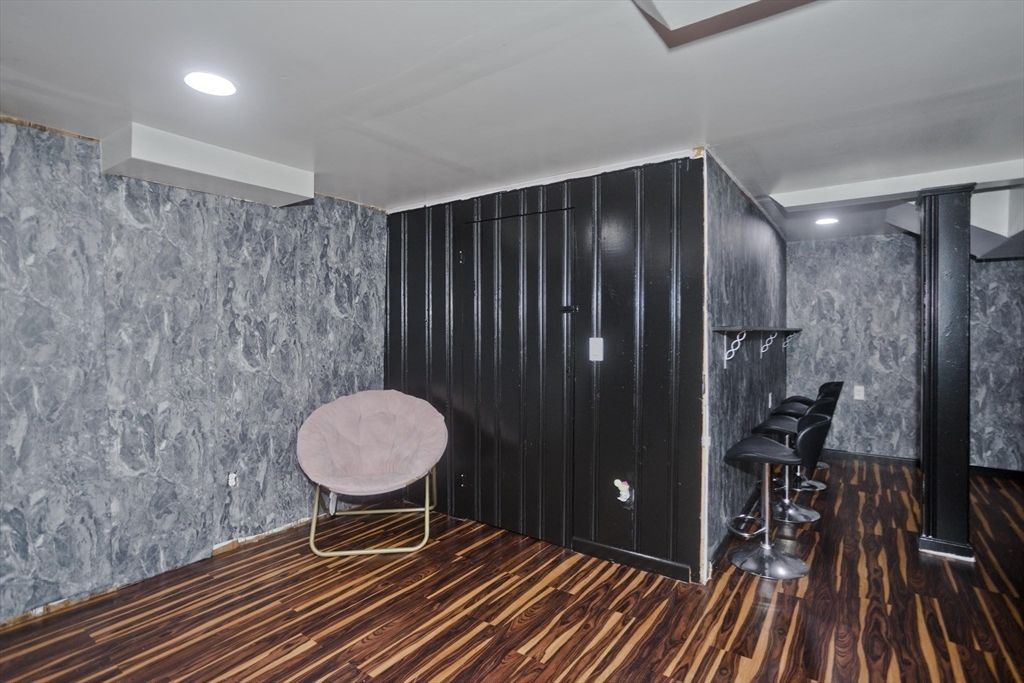 10 View Street Holyoke, MA 01040 - Photo 35 of 38 a bathroom with a sink and a mirror