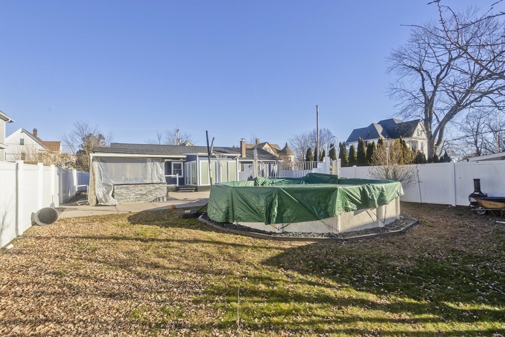 10 View Street Holyoke, MA 01040 - Photo 7 of 38 a view of a house with a yard and fence