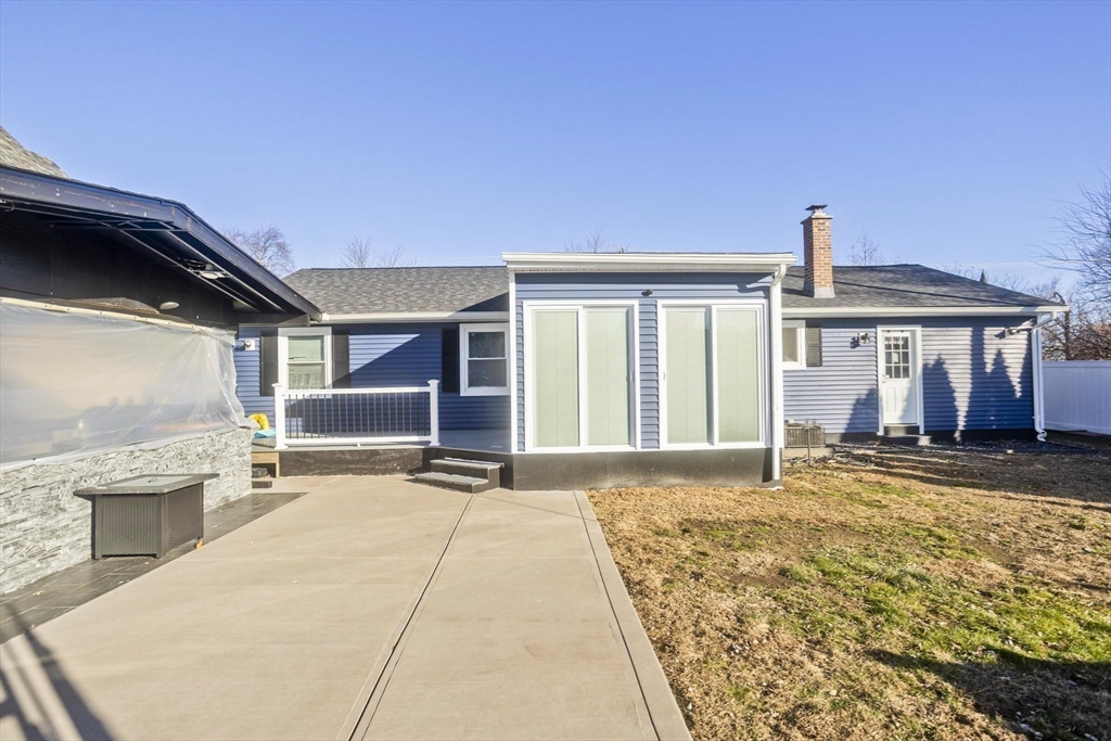 10 View Street Holyoke, MA 01040 - Photo 8 of 38 a front view of a house with a patio