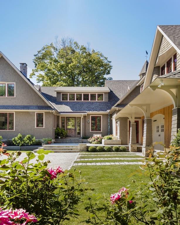 34 Martins Lane Hingham, MA 02043 - Photo 2 of 42 a front view of a house with swimming pool having outdoor seating