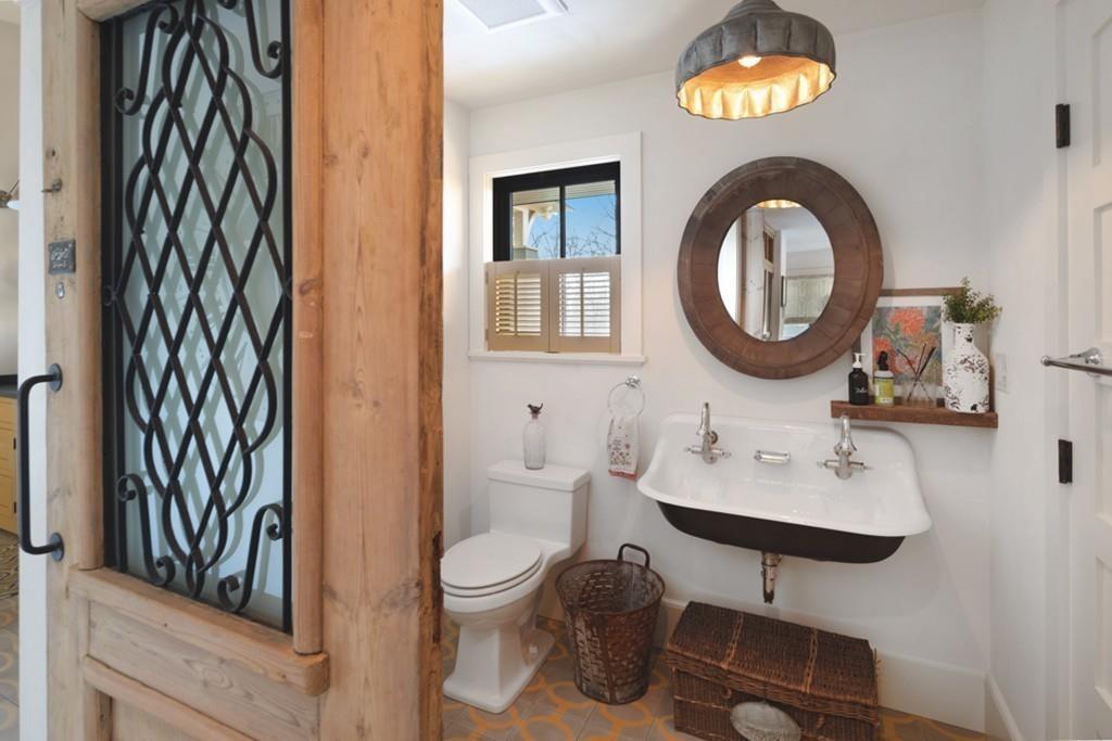 34 Martins Lane Hingham, MA 02043 - Photo 22 of 42 a bathroom with a toilet a sink and a mirror