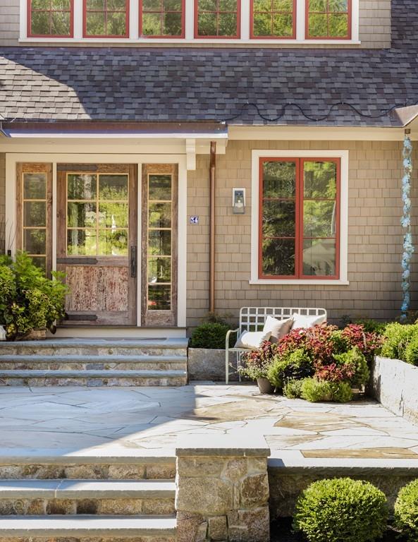 34 Martins Lane Hingham, MA 02043 - Photo 3 of 42 a front view of a house with a yard