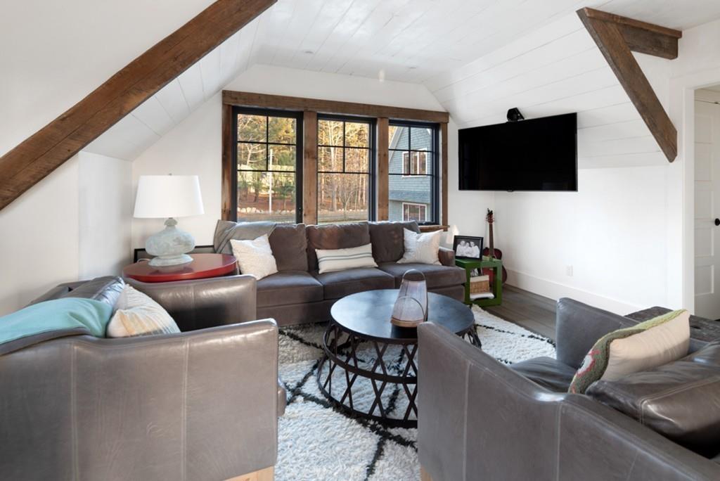 34 Martins Lane Hingham, MA 02043 - Photo 34 of 42 a living room with furniture and a flat screen tv