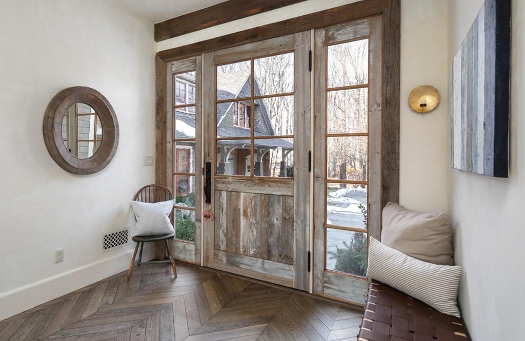 34 Martins Lane Hingham, MA 02043 - Photo 4 of 42 a living room with furniture and a floor to ceiling window