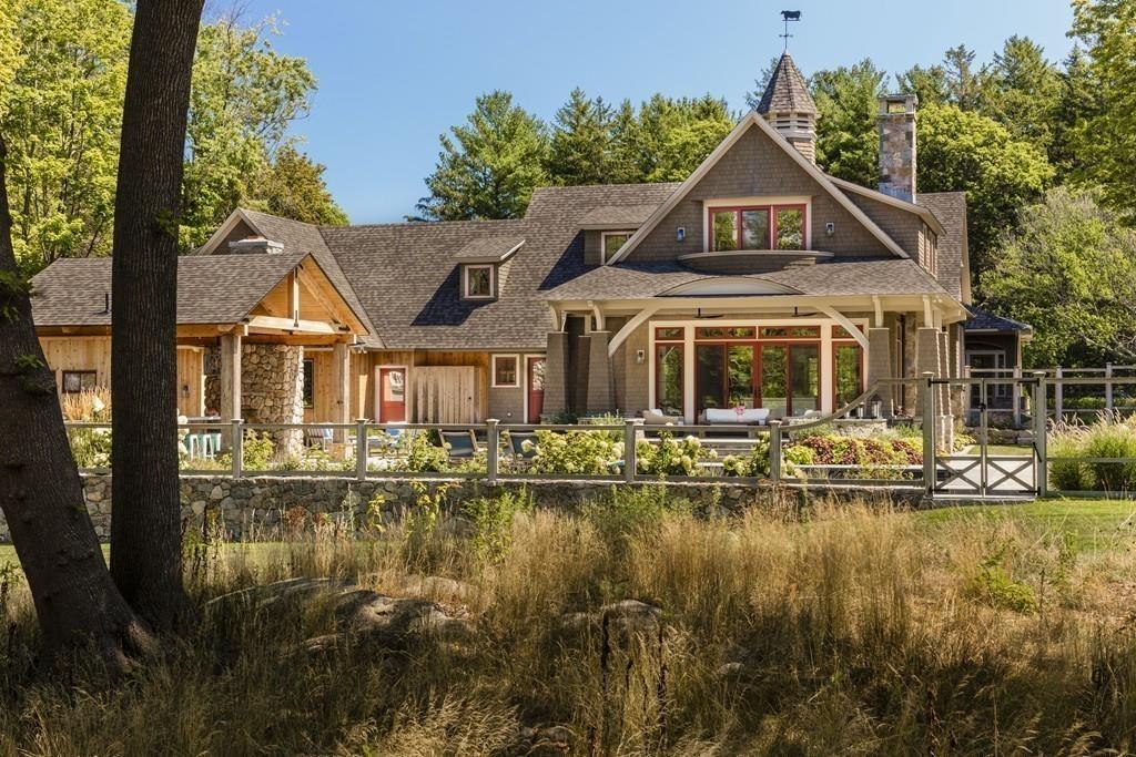 34 Martins Lane Hingham, MA 02043 - Photo 41 of 42 a front view of a house with a boat