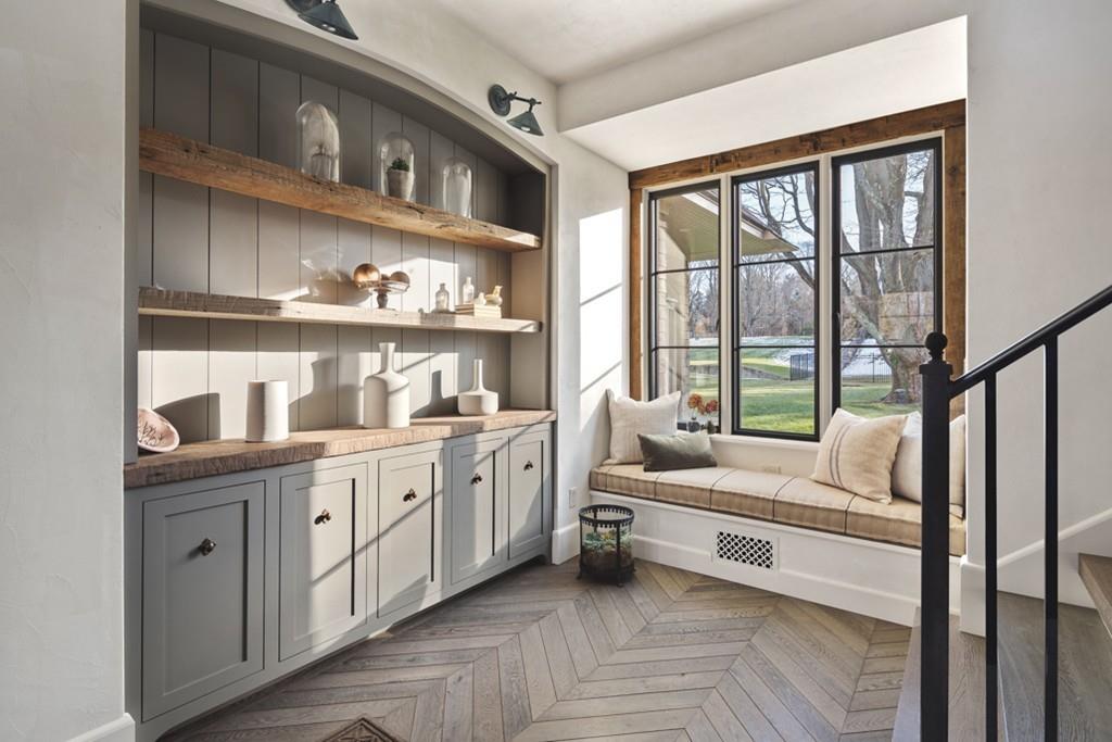 34 Martins Lane Hingham, MA 02043 - Photo 5 of 42 a spacious bedroom with a bed and a large window