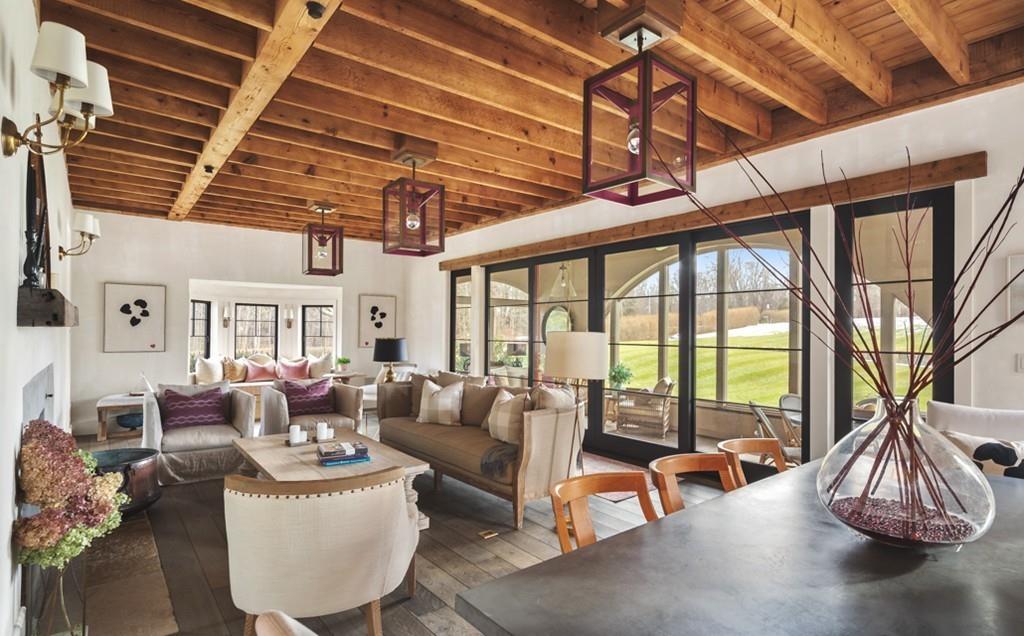 34 Martins Lane Hingham, MA 02043 - Photo 7 of 42 a living room with furniture a fireplace and wooden floor