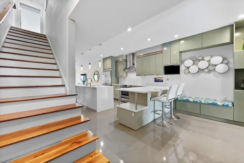a living room with furniture and a table