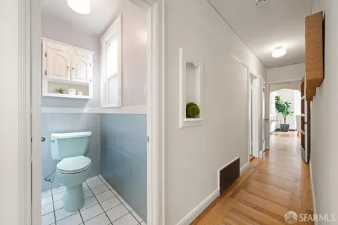 a bathroom with a sink and toilet