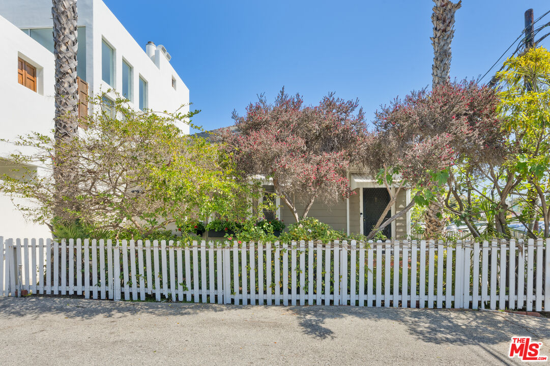 137 Strand Street Santa Monica, CA 90405 - Photo 1 of 11 a porch with a trees