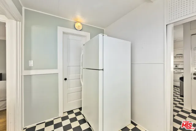 a bathroom with a shower and a sink