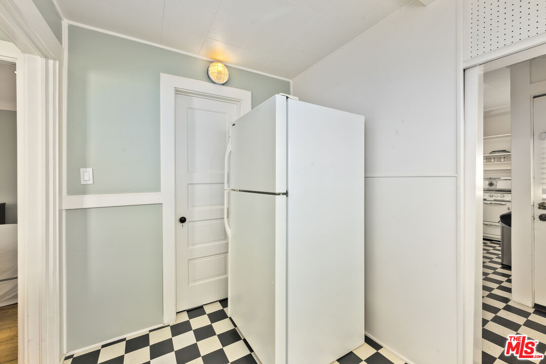 137 Strand Street Santa Monica, CA 90405 - Photo 3 of 11 a bathroom with a shower and a sink