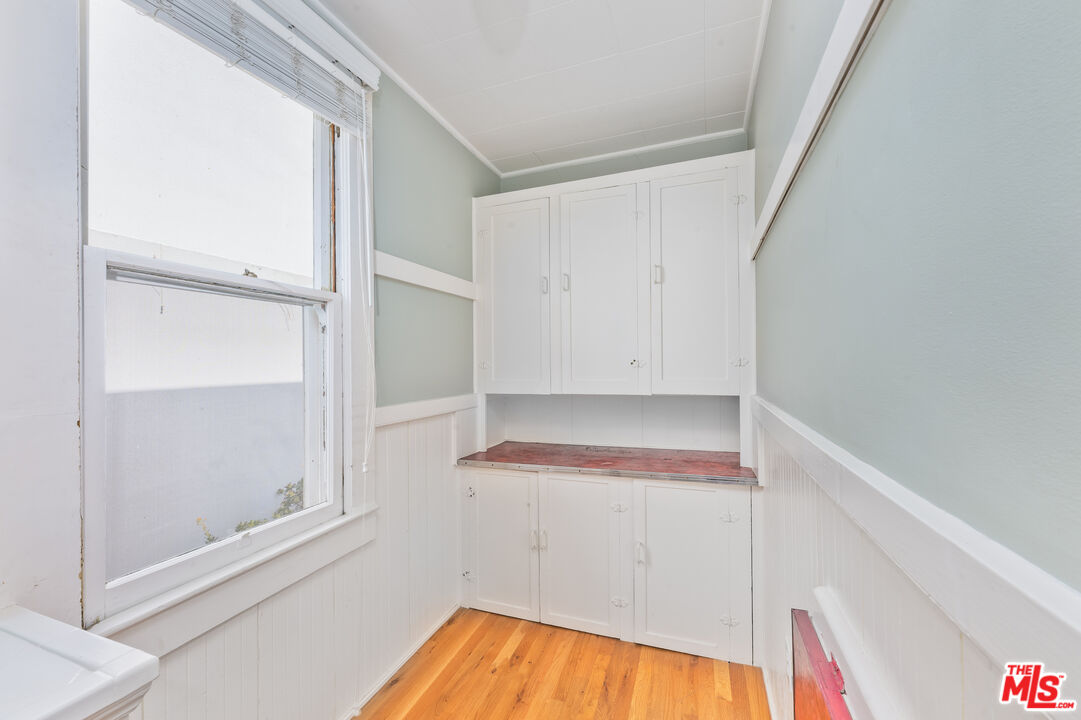 137 Strand Street Santa Monica, CA 90405 - Photo 5 of 11 a view of walk in closet with empty racks