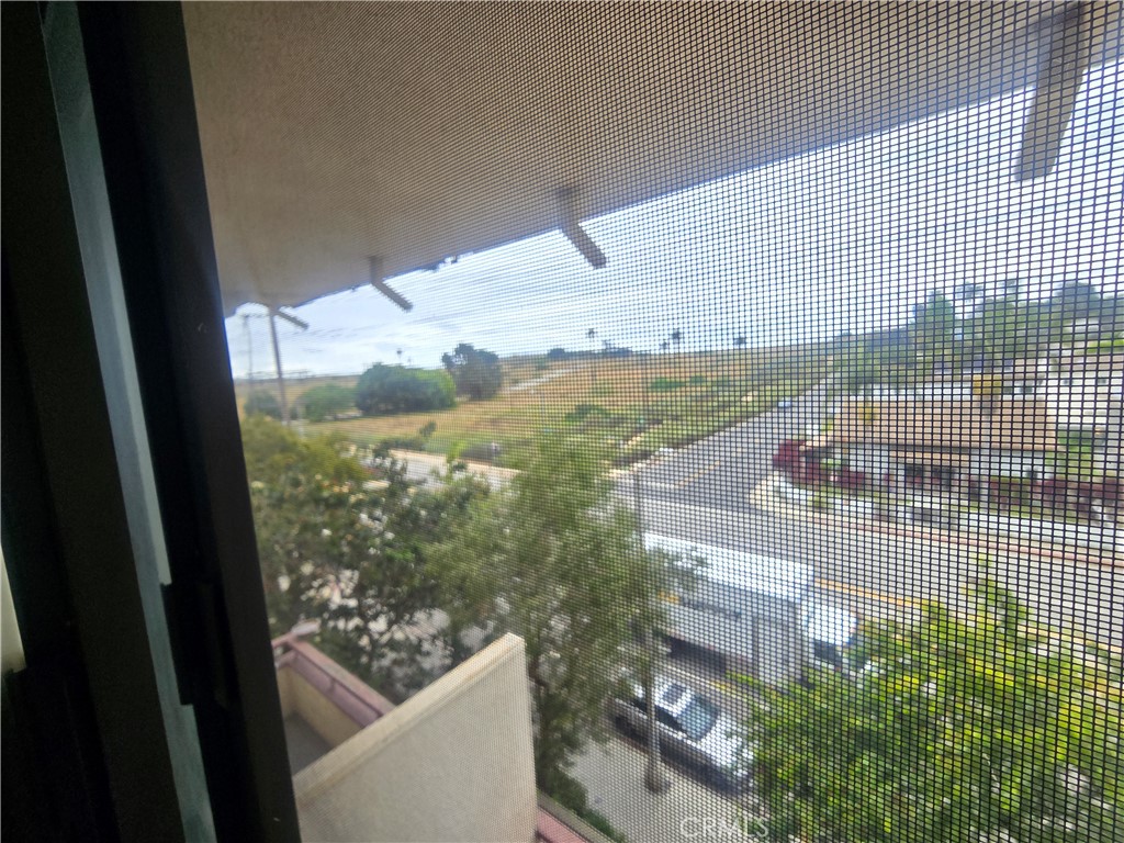 8828 Pershing Drive, Unit 121 Playa del Rey, CA 90293 - Photo 27 of 54 a view of a balcony with an outdoor space