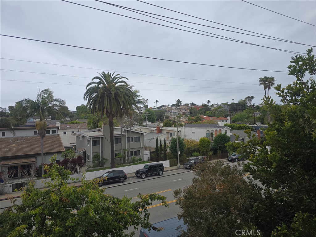 8828 Pershing Drive, Unit 121 Playa del Rey, CA 90293 - Photo 38 of 54 a view of a lake with a building in the background