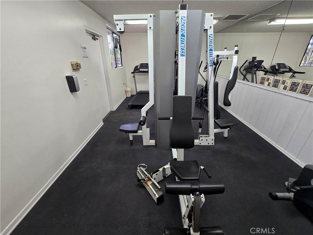 8828 Pershing Drive, Unit 121 Playa del Rey, CA 90293 - Photo 45 of 54 a view of a room with gym equipment