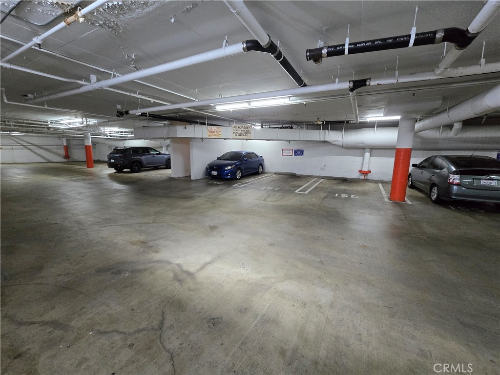 8828 Pershing Drive, Unit 121 Playa del Rey, CA 90293 - Photo 50 of 54 a view of parking garage with cars