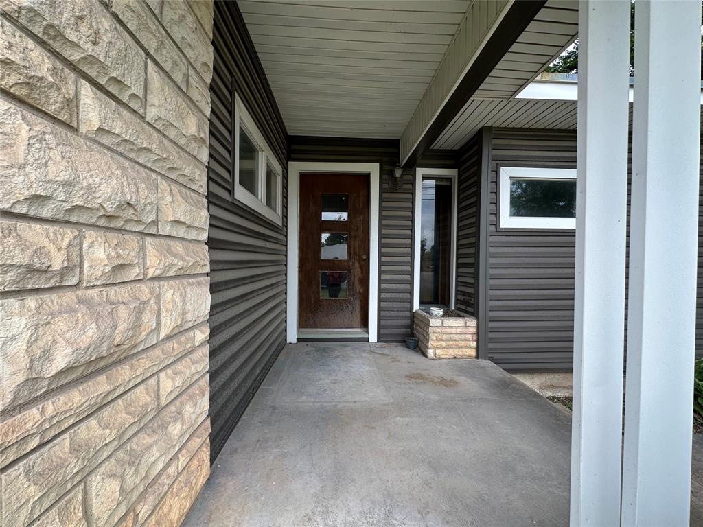 7350 Highway 67, Unit 377N Comanche, TX 76442 - Photo 4 of 13 a view of front door of house