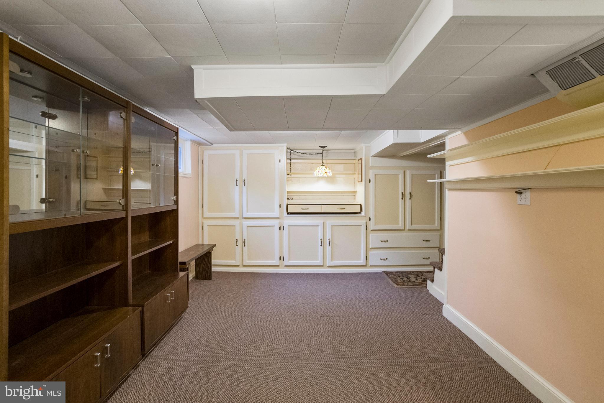 10016 Tenbrook Drive Silver Spring, MD 20901 - Photo 19 of 23 Lower level built in cabinets.