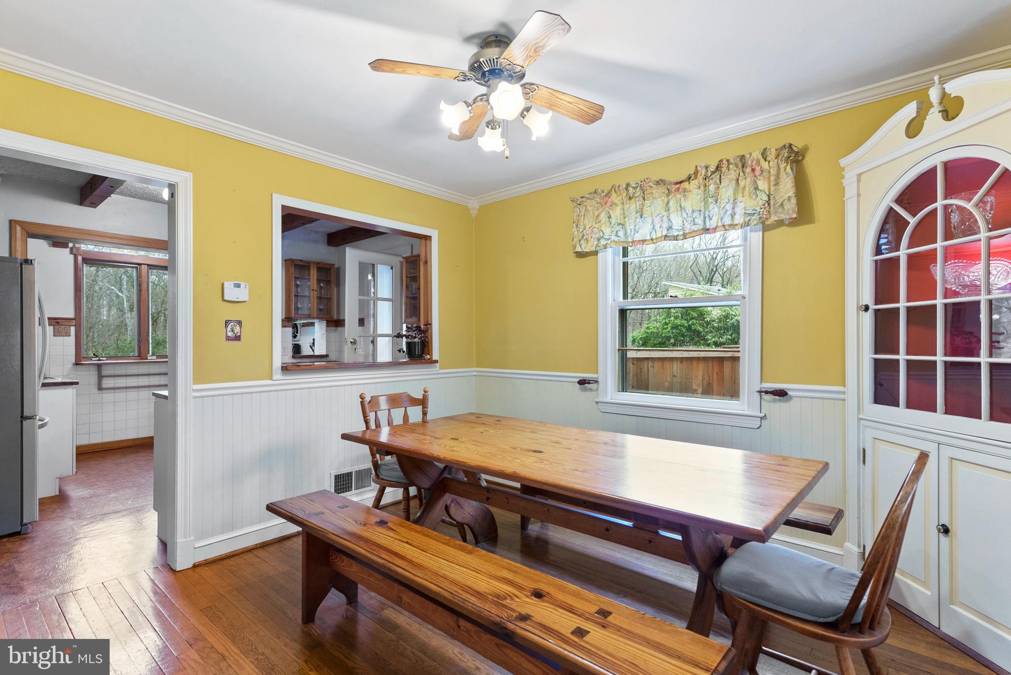 10016 Tenbrook Drive Silver Spring, MD 20901 - Photo 7 of 23 Hardwood floors continue into the dining area.
