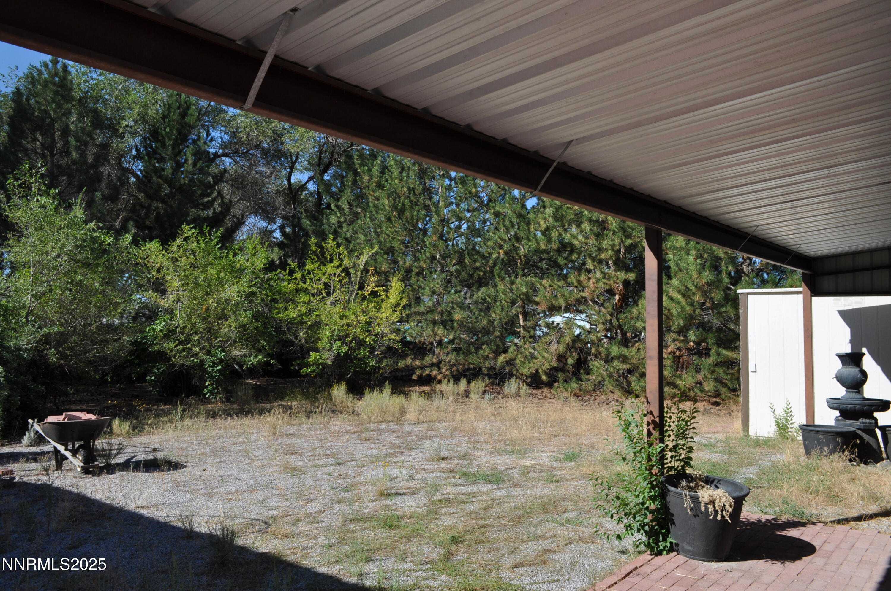 17940 Cold Springs Drive Reno, NV 89508 - Photo 20 of 21 a backyard of a house with lots of green space