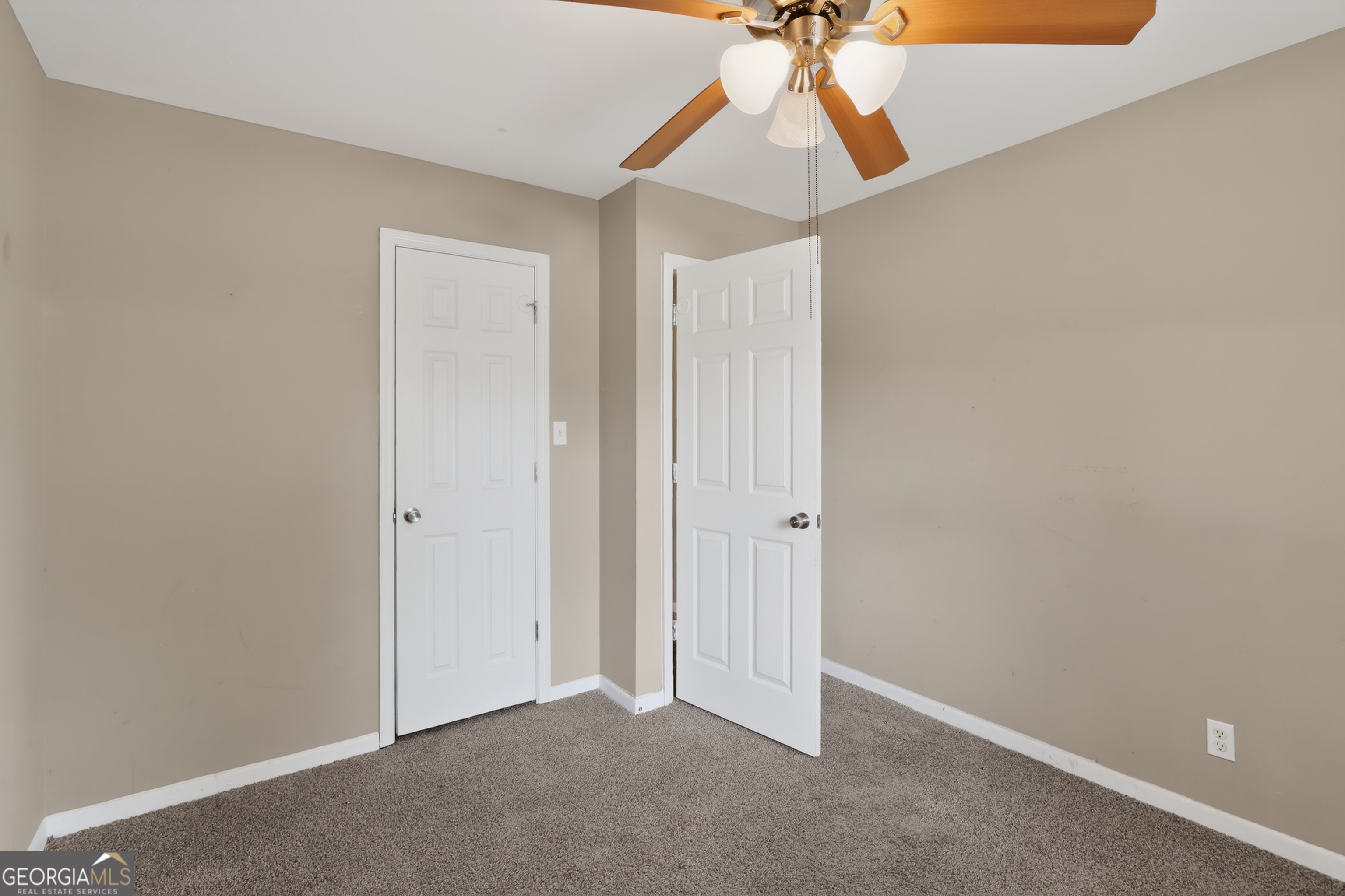 3606 Alene Circle Augusta, GA 30906 - Photo 17 of 30 a view of an empty room and a chandelier fan