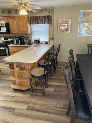 a view of a dining room with furniture